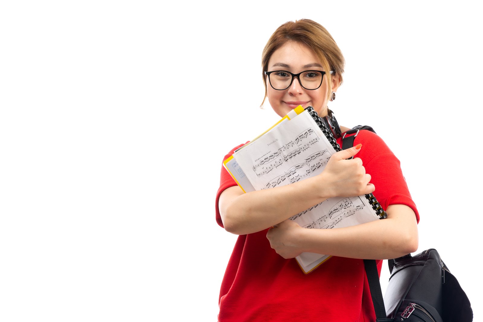 Uploaded imagefront-view-young-female-student-red-t-shirt-black-jeans-wearing-black-earphones-holding-note-copybook-smiling-white.jpg